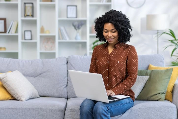 Girl using internet on laptop