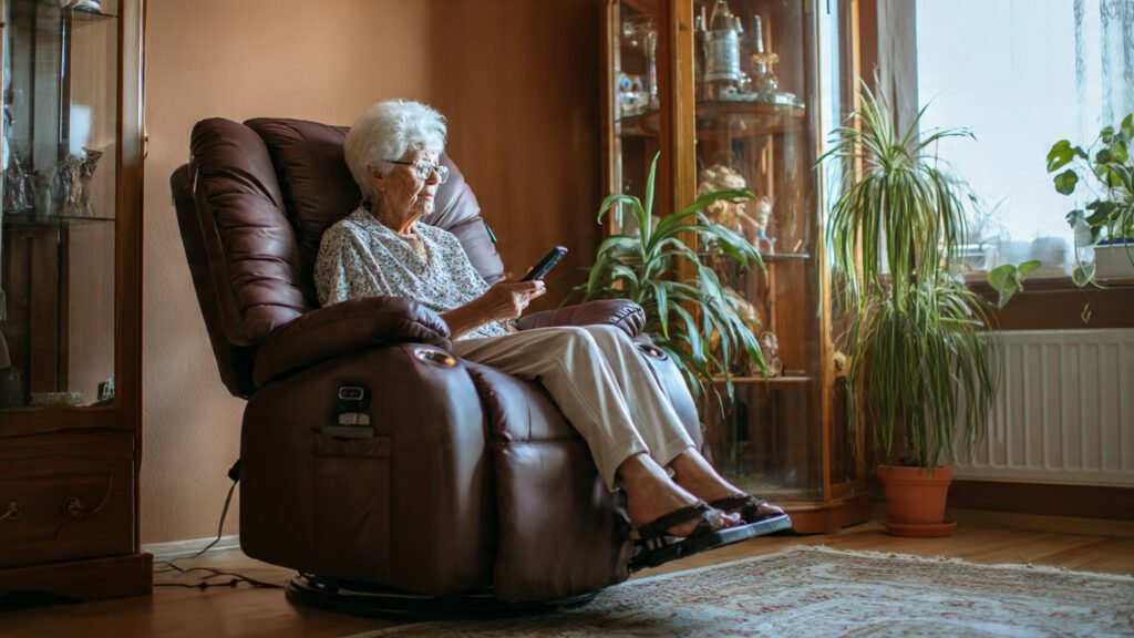 Voice-controlled chair for the elderly with advanced technology for pain relief and comfort.